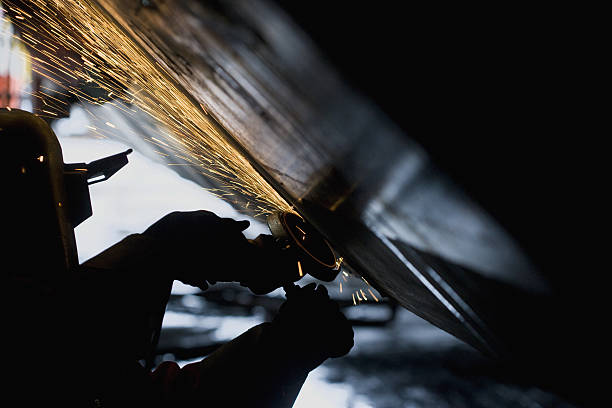 Craftsman working on a boat hull